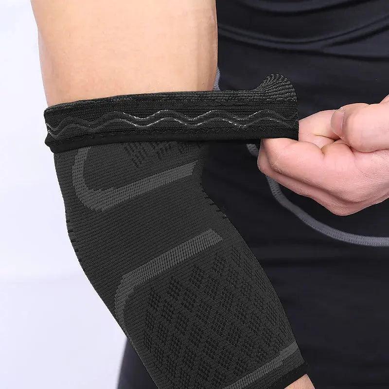 AOLIKES 1PCS Supporto per gomito Elastico Palestra Sport Gomito protettivo Pad Assorbe il sudore Sport Basket Manica del braccio Gomito Tutore - My Hashtag Shop