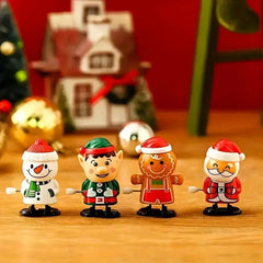 3 sets of wind-up Christmas gifts for the holiday season: moving Santa Claus, snowman and a reindeer in your hands. HASHTAG